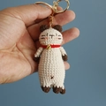 Handmade beige crochet cat keychain with brown accents, red collar and golden bell charm - Beige Cat Style