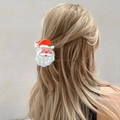 Cute Santa Claus claw clip worn by a model for a festive Christmas hairstyle - Santa with Christmas Tree