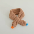 Detail of camel rib-knit baby scarf featuring vibrant orange and blue pom-poms - Colorful Pom Pom Style / 60-80cm / Khaki