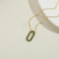 Collier en or avec pendentif ovale orné de zircons verts brillants sertis - Vert