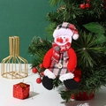 Christmas snowman plush ornament featuring a red and black plaid hat and wooden button - Walking Snowman
