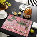 Pink Christmas placemat with festive ornaments and snowflakes on a dark wooden table - CD57-11