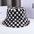 Detail shot of plush black and white checkerboard bucket hat with soft faux fur texture - M (56-58cm) / Black White Grid