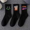 Three pairs of black cotton crew socks with colorful Brooklyn and street graffiti prints - 3 Pairs (Styles 16, 20, 27)