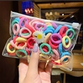 Elastic candy color hair ties set in a transparent daisy print zipper storage bag - 50 Pcs Bag / Colorful