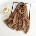 Detail of tan cotton linen scarf with textured pleats and natural frayed edges - Light Coffee