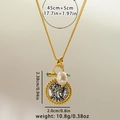 Retro gold sun bow necklace with coin pendant, pearl, and green stone variant - Portrait