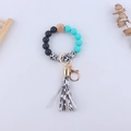 Cow print silicone bead wristlet keychain with leather tassel and wood hexagon bead - Cow