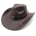 Detail of vintage brown cowboy hat featuring bull head buckle and metal studs decoration - Tie-Dye Coffee