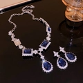 Silver jewelry set featuring pear-cut deep blue stones with brilliant zircon accents - Dark Blue Pear Shape Main Stone Set / Silver-Blue