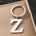 Polished silver metal letter Z keychain on brown gift box with elegant finish - Letter Z
