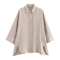 Detailed flat lay of a light beige loose-fit linen shirt with classic collar and side slits - XS / Apricot Top