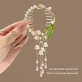 Elegant gold lily of the valley hair clip with white pearls and pink floral tassels - J21 Pink Star Tassel Ponytail Buckle