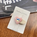 Pink heart acetate hair clip with iridescent rhinestone center on beige duckbill base - Pink