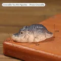 Lifelike purple clay crocodile tea pet figurine with textured skin for tea ceremonies - Crocodile Lying
