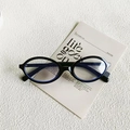 Modische schwarze ovale Blaulichtfilter-Brille mit elegantem Rahmen für Damen - Schwarzer Rahmen Klare Gläser