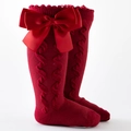 Red knee high baby socks with large satin bows and classic cable knit texture - Burgundy