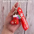 Christmas stocking keychain with cartoon reindeer and red silicone strap, 4.4x4.5cm size - Christmas Stocking-3