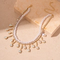 Double-layered gold necklace with pearls and iridescent teardrop crystal pendants - Zircon Water Drop Pearl Necklace / Gold