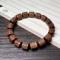 Buddhist rosewood prayer beads bracelet featuring engraved sutra barrel charms - 10mm Barrel Bead Six-Word Mantra