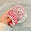 Pink and floral spiral hair ties in resin material for durable daily styling - 4# Girlie Pink Patterns (6pcs Bag)