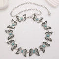 Close-up of vintage butterfly waist chain with turquoise stones and silver metal finish - Antique Silver Turquoise Butterfly Style (WG-0990)