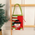 Knitted Christmas gift bag featuring a 3D snowman doll with red and green drawstring - Snowman
