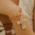Golden heavy punk Cuban chain bracelet with a layered cross pendant on a female wrist - Gold Frame Two-tone Bracelet (DZ-438)