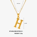 Gold stainless steel square letter H pendant necklace with textured bark finish and twist chain - Letter H