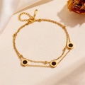 Double-layered gold titanium steel bracelet with black Roman numeral charms and silk - Black Shell Roman Numerals Bracelet