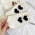 Oatmeal knit mid-tube socks featuring plush black hearts and embroidered cherry details - Heart