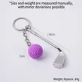 Mini metal golf club keychain with a textured purple ball and silver keyring - Purple Golf Ball + Club
