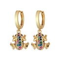 Detailed close-up of gold hoop earrings with colorful zircon frog pendant on white background - Frog-Gold (Smooth Loop)