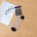 Women's sheer nylon crew sock in beige with black wave patterns and contrast trim - Black Diagonal Stripe