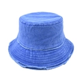 Close-up of distressed frayed edges on a vintage washed blue denim bucket hat - Blue