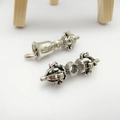 Detailed view of silver Tibetan Vajra and Bell pendants for DIY Buddhist jewelry - Tibetan Pendant Pair (21# Pair) / 1 Pair Pack / Silver