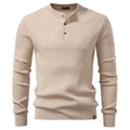 Detail of beige ribbed knit Henley shirt featuring three-button placket and fabric texture - Apricot