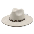Detail of cream felt fedora hat featuring a woven band with a blue evil eye charm - M (56-59cm) / Beige Suede