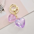 Creative purple acrylic double heart keychain with gold hardware and glitter finish - Purple