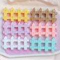Detailed macro view of six colorful resin mini picket fences for DIY craft decoration - Mixed Random Style
