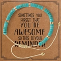 Adjustable turquoise and gold beaded bracelet on a kraft card with inspirational quote - Lake Blue Disc Beads-Cream Cord-With Reminder Card