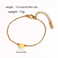 Golden stainless steel heart pendant bracelet with length specifications on white background - Bracelet