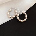 Macro shot of silver C-shaped multi-link hoop earrings on a high-contrast background - Style 14 (Ear Clip) / Large / Silver