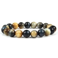 Macro shot of 8mm tiger eye stone beads showing natural blue and yellow mineral textures - Dreamy Tiger Eye