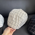 Detailed view of linen blend newsboy caps with vintage plaid pattern texture - M (56-58cm) / Beige