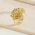 Detailed close-up of 14K gold plated flower ring with layered petals on a stone surface - Flower Style (JZ0349-3)