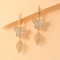 Detailed macro view of champagne gold butterfly earrings with zircon leaf pendants - EH090 Full Zircon Butterfly Leaf Style