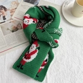 Green knitted Christmas scarf featuring Santa Claus patterns in a cozy winter style - Santa Claus Green