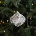 Sparkling silver onion-shaped Christmas ornament with white wave glitter detail on tree - Silver Glitter Ball Style D