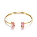 Polished gold-tone stainless steel open bangle with rectangular pink zircon accents - Pink Rectangle